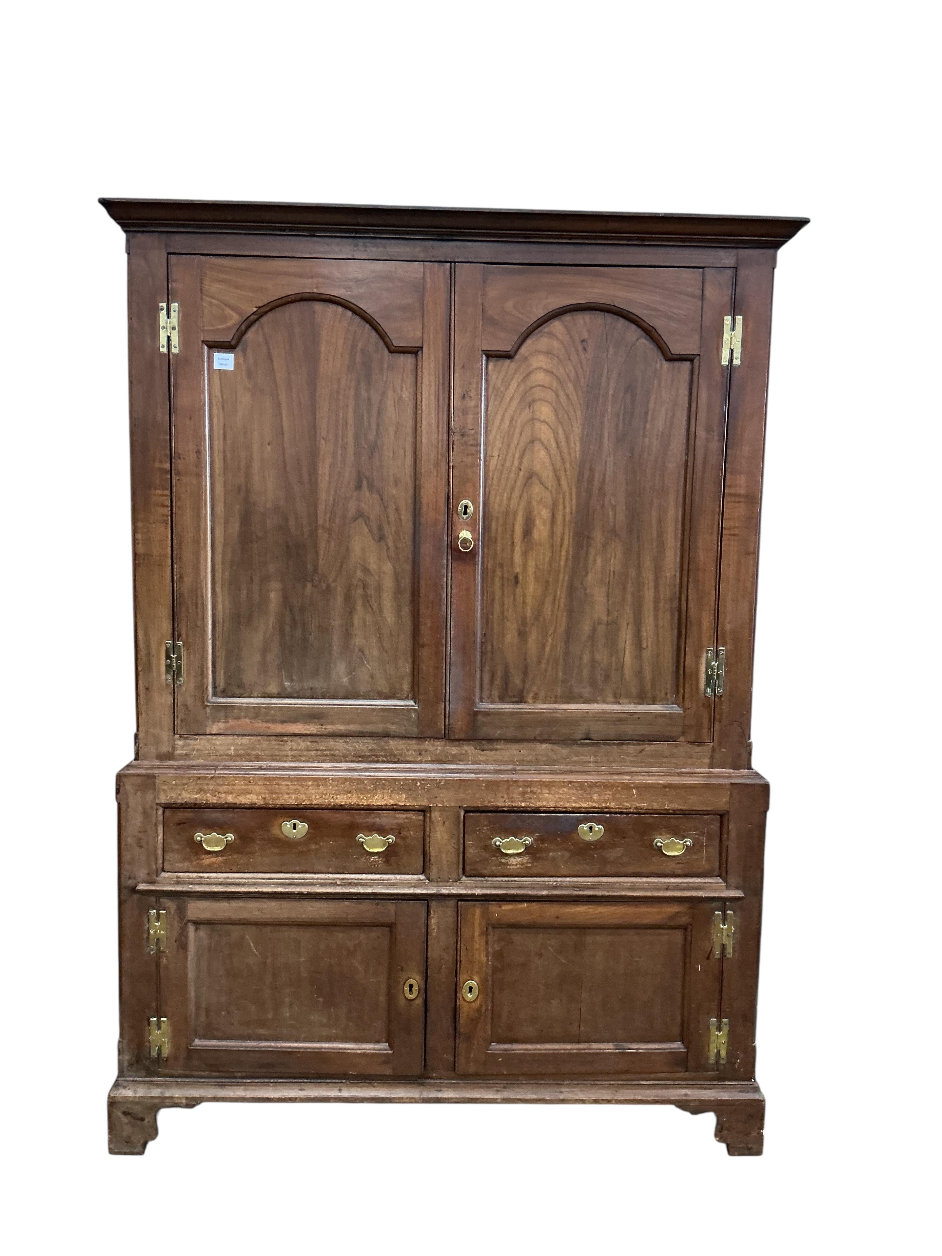A George III fruitwood press cupboard, width 144cm, depth 41cm, height 204cm